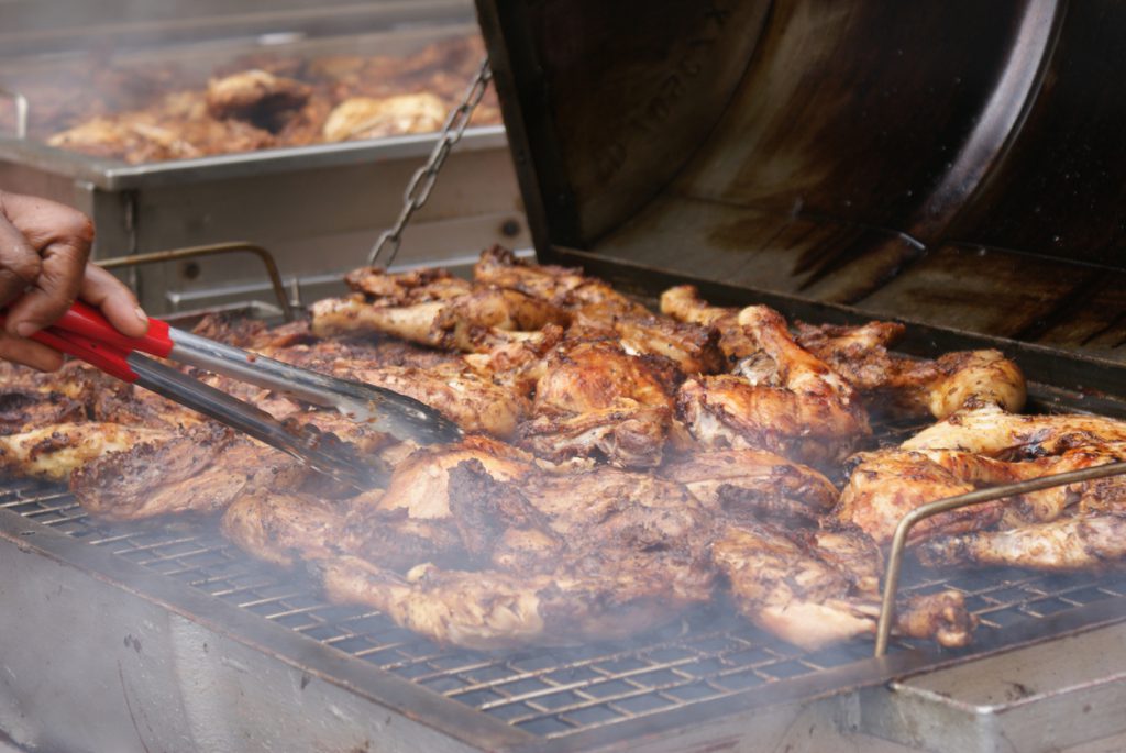 A Barbecued jerk chicken at a reggae festival